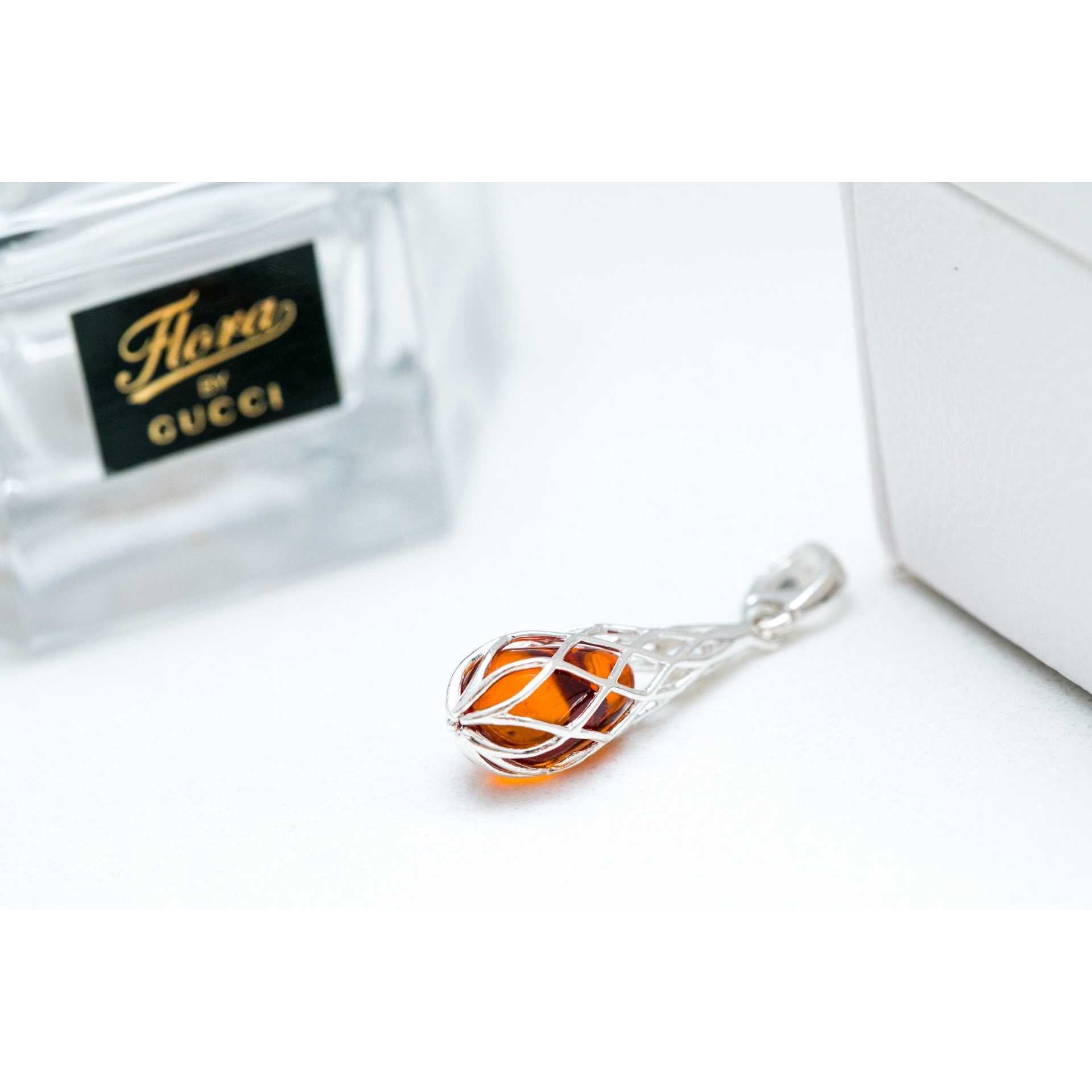 Caged Teardrop Amber Pendant Spirit Journeys