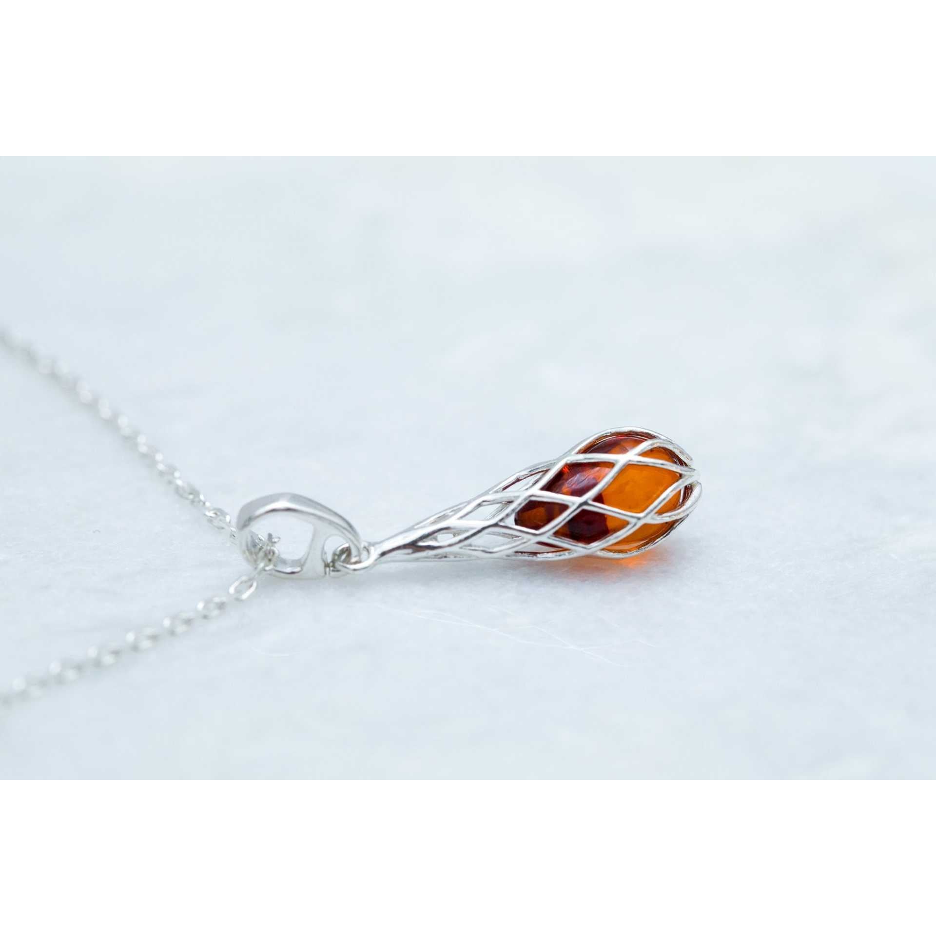 Caged Teardrop Amber Pendant Spirit Journeys